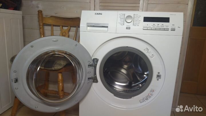 Узкая Стиральная машина AEG AMS 7000 U на 6 кг