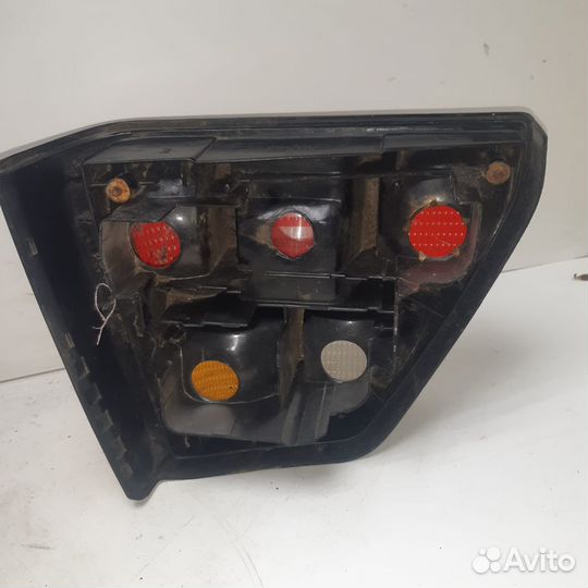 Фонарь задний наружный левый (крыло) VW Golf 2