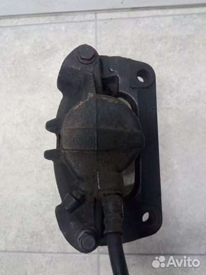 Суппорт тормозной передний левый Renault Scenic 2