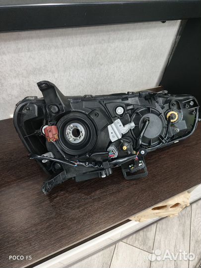 Фара левая для Mitsubishi lancer 10, оригинал