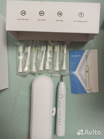 Электрическая зубная щётка