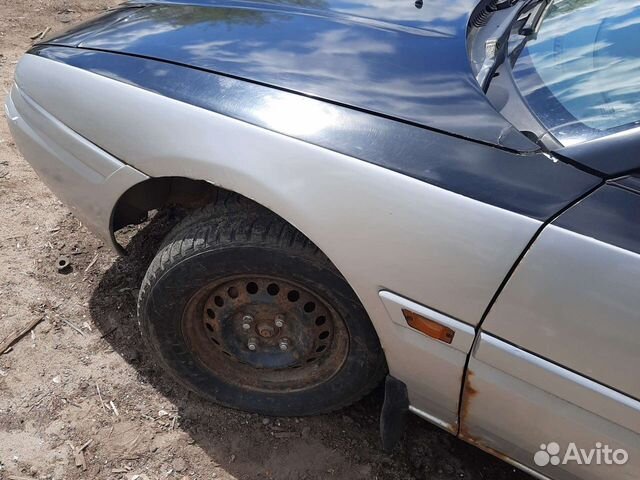 Левое крыло mazda 323 f bg