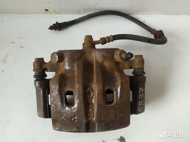 Суппорт тормозной передний левый nissan X-trail