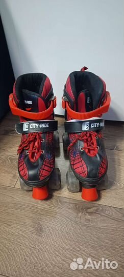 Роликовые регулируемые коньки