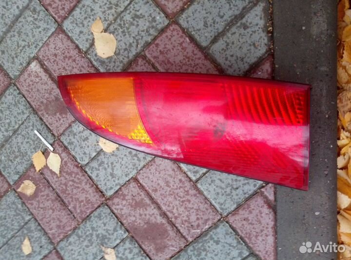 Фонарь левый хечбэк Фокус 1 1998-2004