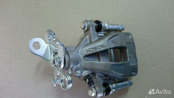 Суппорт тормозной задний на джили эмгранд