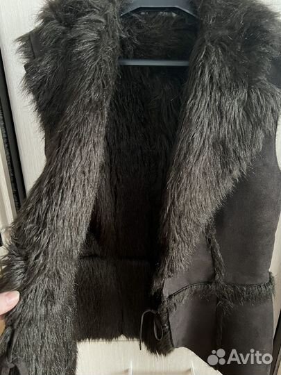 Меховая жилетка