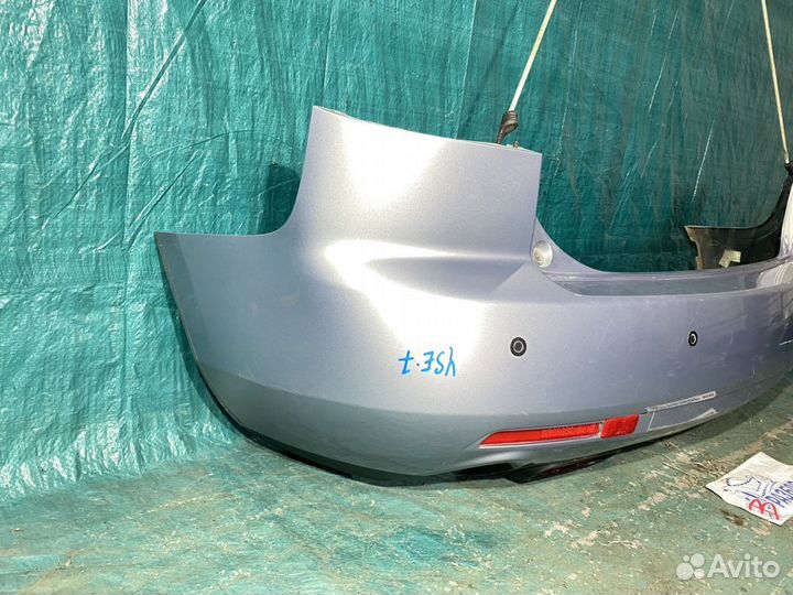 Бампер задний Mazda CX-7 I (2006—2009)