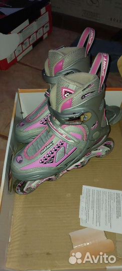 Роликовые коньки