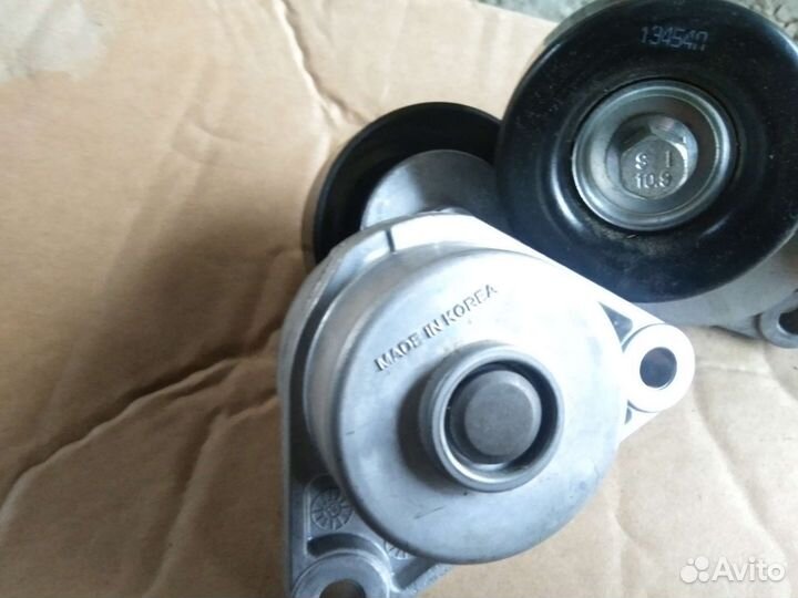 Натяжитель ремня Chevrolet Lacetti Aveo 1,6 1,4