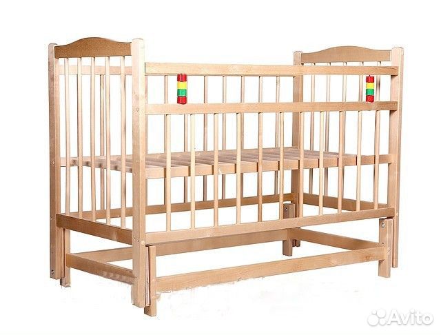 Детская кроватка с маятником