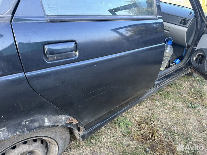 Задняя дверь priora