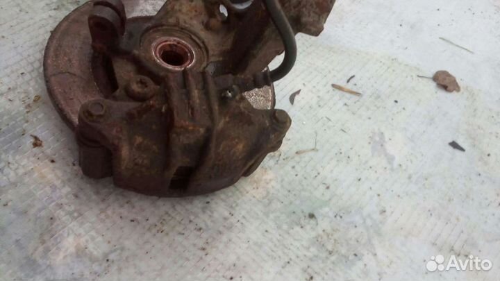 Суппорт левый Пежо 206 1.4