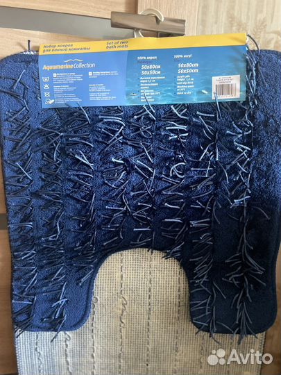 Новые коврики для ванной