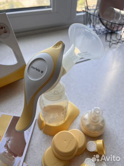 Молокоотсос medela ручной
