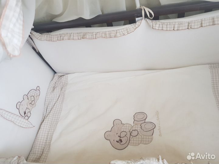 Детская кроватка с продольным маятником