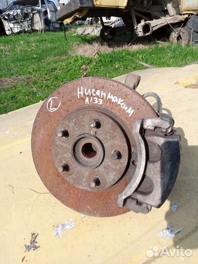 Кулак поворотный левый nissan maxima A33