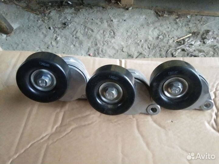 Натяжитель ремня Chevrolet Lacetti Aveo 1,6 1,4