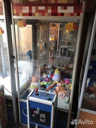 Игровой аппарат с игрушками