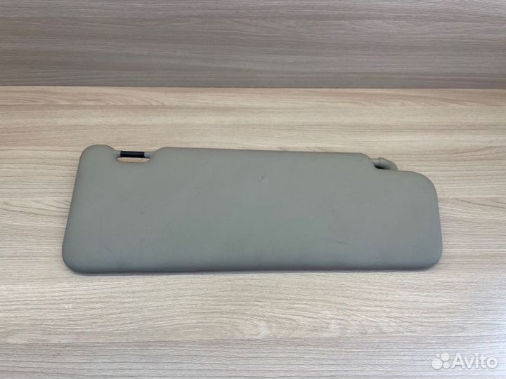 Козырек солнцезащитный левый Renault Logan