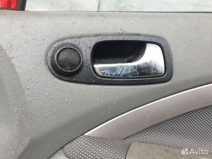 Обшивка двери передней правой Chevrolet Lacetti