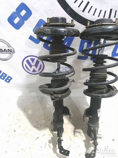 Стойка амортизатора передняя Nissan Primera P12