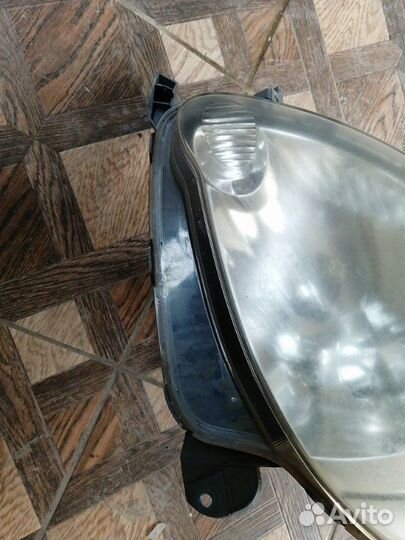 Фара передняя левая Toyota Funcargo NCP20