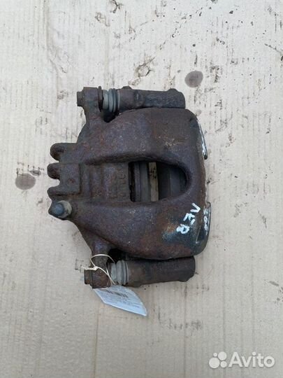 Суппорт тормозной передний правый Peugeot 308