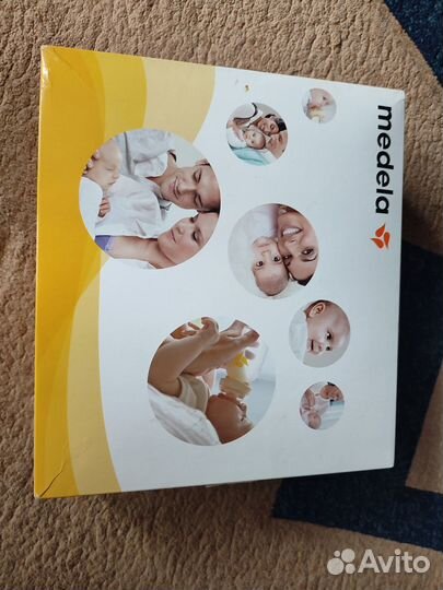 Молокоотсос medela