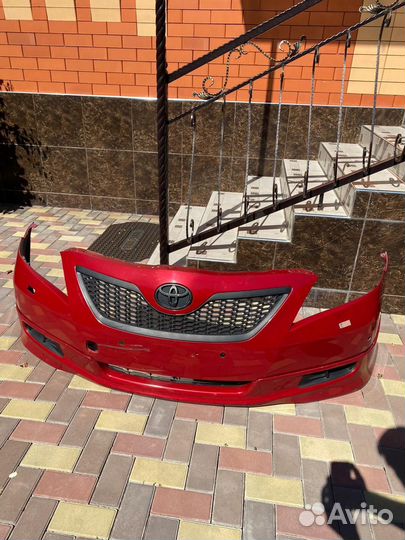 Оригинальный передний бампер камри 40