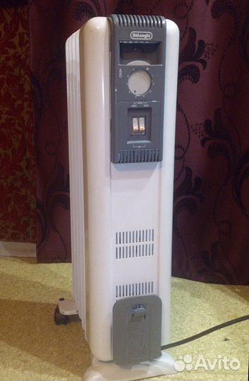 Масляный обогреватель DeLonghi