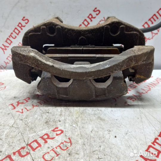 Суппорт тормозной передний правый Nissan X Trail