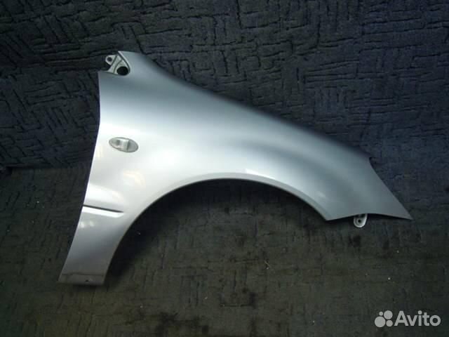 Крыло Mitsubishi Lancer 9 в цвет кузова