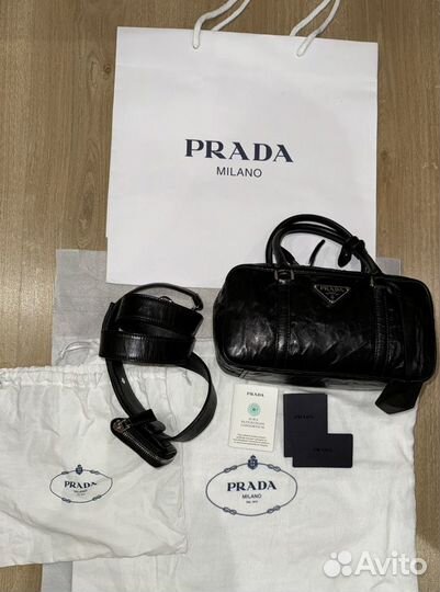 Сумка Prada Re-Edition Antique Small Top Handle