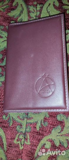 Два альбома с монетами разных времён и эпох