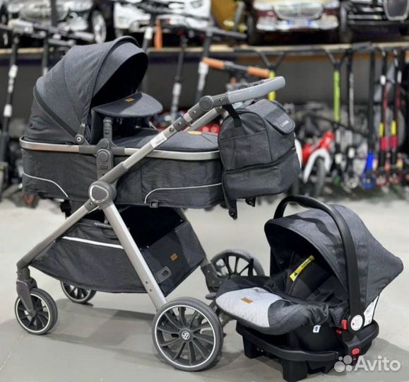 Коляска с автолюлькой, базой, конвертом 3в1 новая