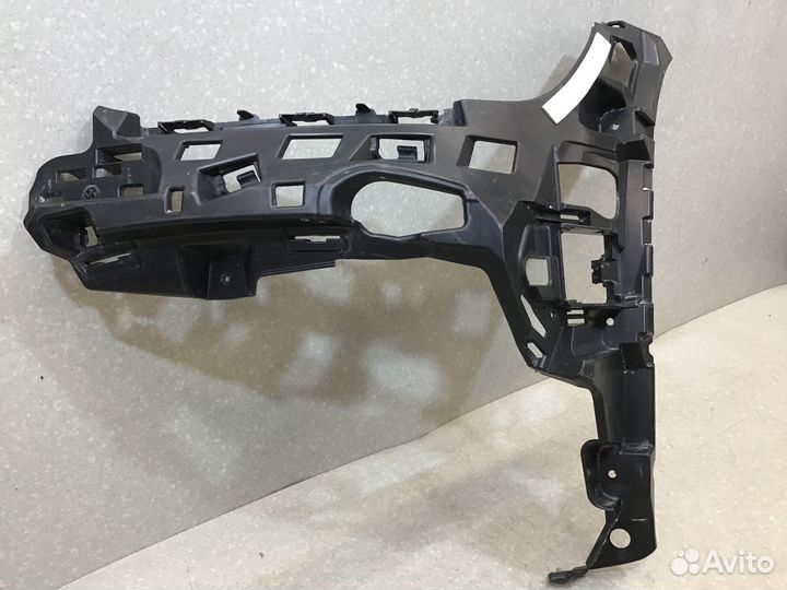 Кронштейн переднего бампера левый Mercedes Benz AM