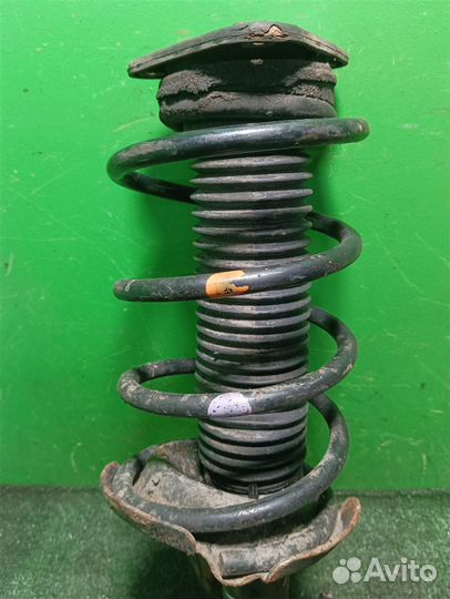 Стойка амортизатора передняя правая Mazda 3 (BL)