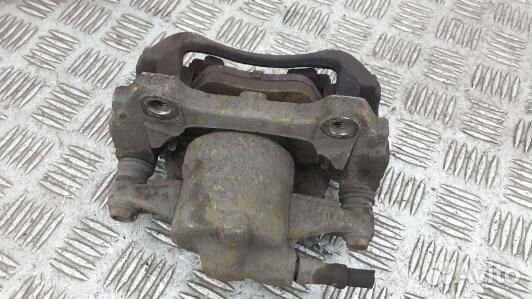 Суппорт тормозной передний левый opel corsa D (9NI