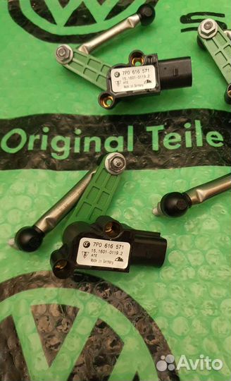 Датчик уровня кузова 7p0616571 VAG Оригинал Новый