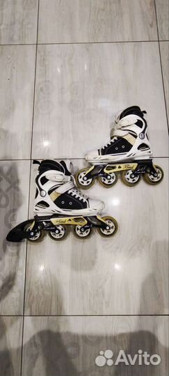 Роликовые коньки head