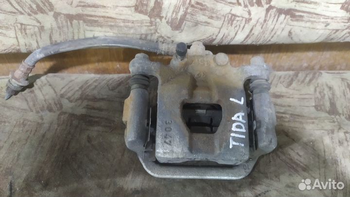 Nissan tiida c11 суппорт задний левый