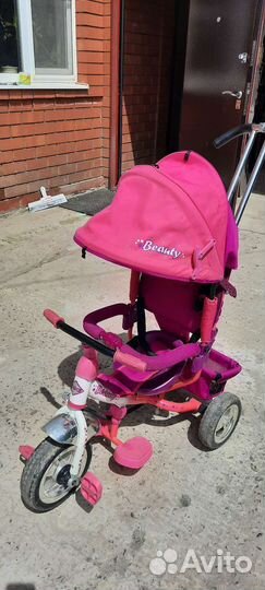 Детский трехколесный велосипед коляска