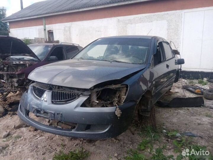 Рычаг подвески передний Mitsubishi Lancer 9