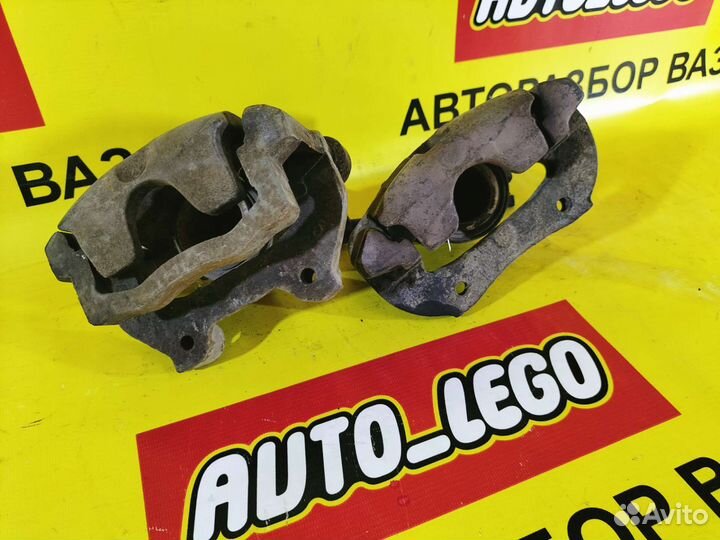 Суппорт передний левый,правый на ладу приору