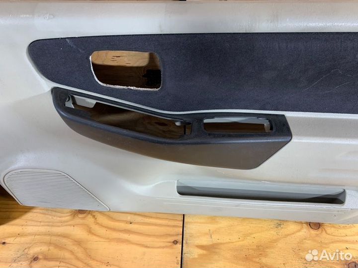 Обшивка двери mitsubishi pajero mini