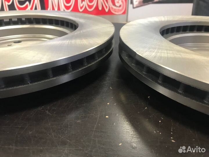 Тормозные диски передние Geely Atlas