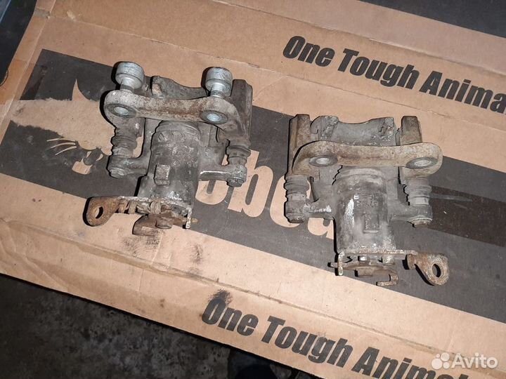 Суппорт тормозной задний Renault Fluence Меган 3