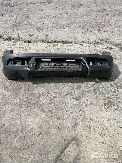 Задний бампер Нива Шевролет