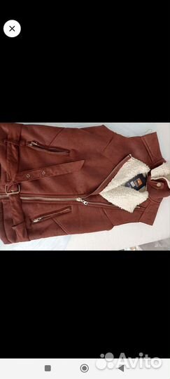 Жилеты теплые женские